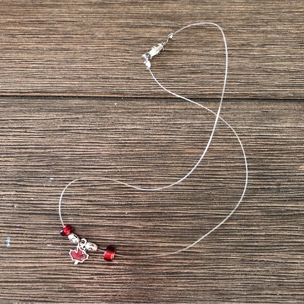 Handmade floating leaf and red beaded necklace